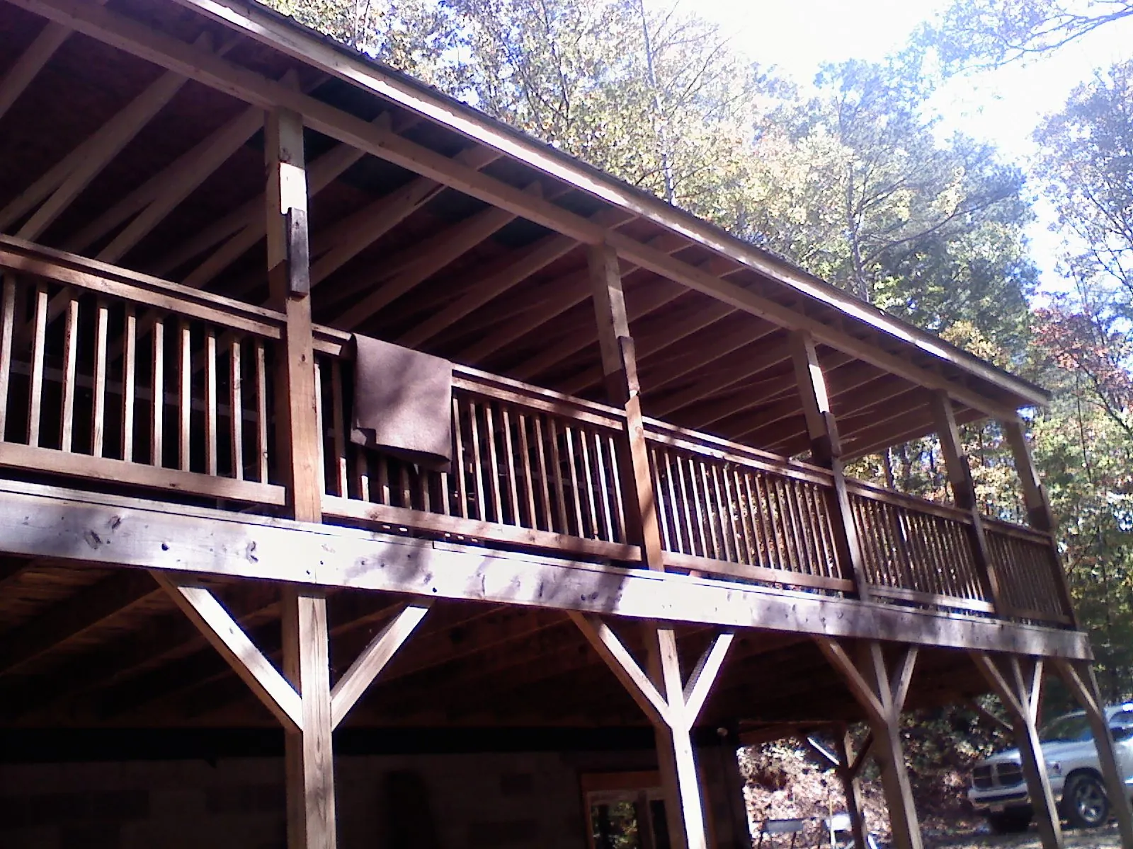 Timber framing under a new elevated porch and deck — Roof Leak Repair in Hebo by Roofing Brothers